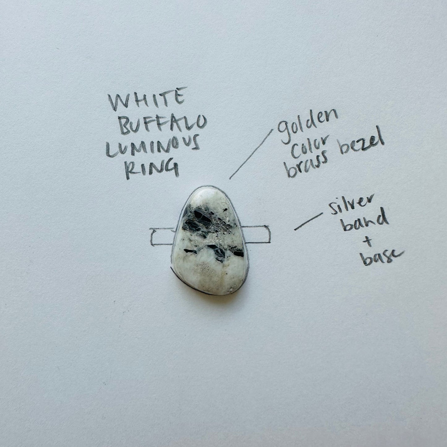 Custom White Buffalo Luminous Ring + 14k gold bezel for Kristin